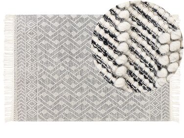 Teppich Wolle schwarz / weiss 160 x 230 cm Fransen Kurzflor KAVAK