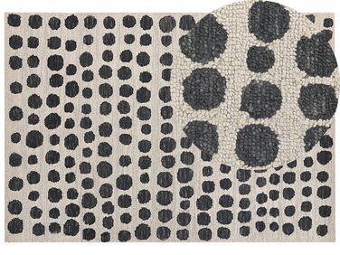 Teppich beige / schwarz 160 x 230 cm gepunktetes Muster HAVRAN