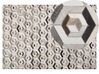 Teppich Kuhfell beige / braun 140 x 200 cm geometrisches Muster Kurzflor TAVAK_787187