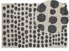Teppich beige / schwarz 140 x 200 cm gepunktetes Muster HAVRAN_836374
