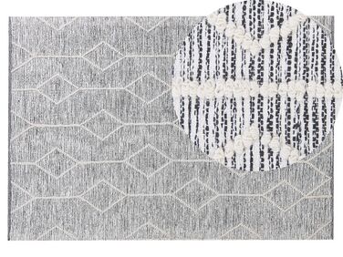 Krátkovlasý koberec krémově šedý 140 x 200 cm EDREMIT