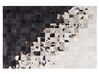 Teppich Kuhfell weiß / schwarz 140 x 200 cm Patchwork Kurzflor KEMAH_850988