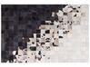Teppich Kuhfell weiß / schwarz 160 x 230 cm Patchwork Kurzflor KEMAH_850989