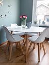 Okrúhly jedálenský stôl ⌀ 120 cm biela/svetlé drevo BOVIO_836196