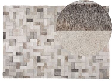 Kožený koberec 140 x 200 cm béžová/sivá KORFEZ
