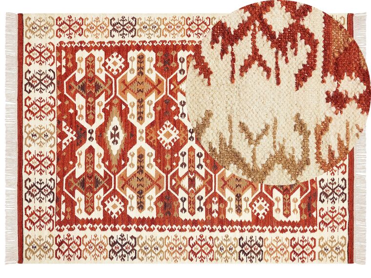 Alfombra kilim de lana naranja/rojo/marrón 160 x 230 cm VOSKEVAZ_859313