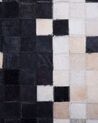 Kožený koberec 160 x 230 cm čierna/béžová ERFELEK_714314