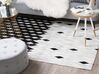 Kožený koberec 140 x 200 cm biela/čierna/béžová MALDAN_742847
