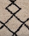 Teppich beige / schwarz 140 x 200 cm Shaggy HAVSA_747556