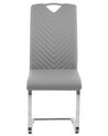 	Conjunto de 2 sillas de comedor de piel sintética gris claro/plateado PICKNES_790022