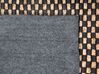 Teppich Leder schwarz / beige 140 x 200 cm kariertes Muster Kurzflor GERCE II_757937
