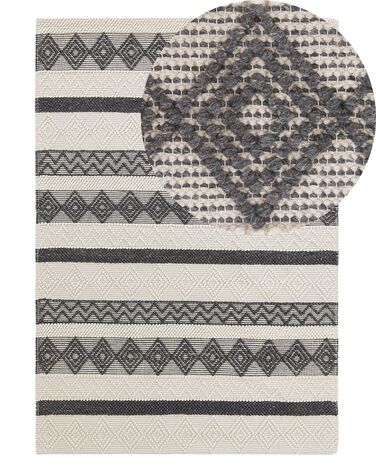Teppich Wolle beige / grau 140 x 200 cm geometrisches Muster Kurzflor DAVUTLAR