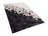Kožený koberec černobílý 140x200 cm KEMAH_742870