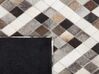 Kožený koberec 140 x 200 cm sivá/hnedá AKDERE_751601