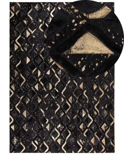 Matto lehmännahka musta/kulta 160 x 230 cm DEVELI Matto lehmännahka musta/kulta 160 x 230 cm DEVELI