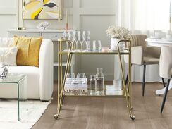 Kultainen tarjoiluvaunu lasitasolla NOTI Kultainen tarjoiluvaunu lasitasolla NOTI