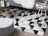 Kožený koberec 140 x 200 cm sivá/čierna EFIRLI_743015