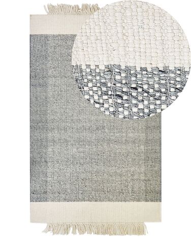 Tapis en laine gris et blanc cassé 140 x 200 cm TATLISU