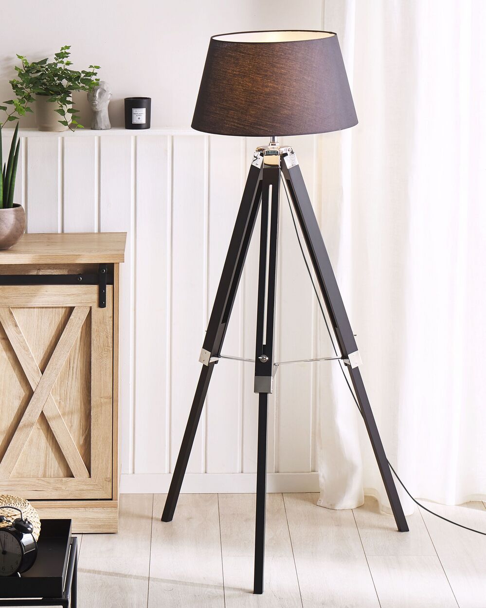 Dark wood tripod lamp outlet