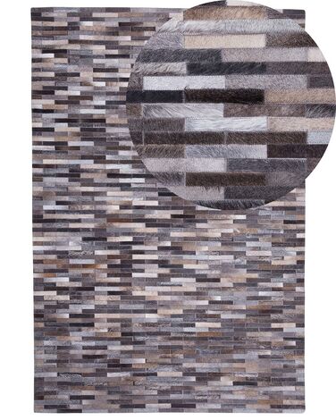 Kožený koberec 140 x 200 cm sivá/hnedá AHILLI