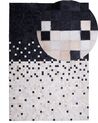 Kožený koberec 140 x 200 cm čierna/béžová ERFELEK_714285