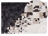 Fekete és fehér bőrszőnyeg 140 x 200 cm KEMAH_742869