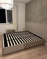 Béžová čalouněná postel s úložným prostorem, skládací 180 x 200 cm DINAN_899997