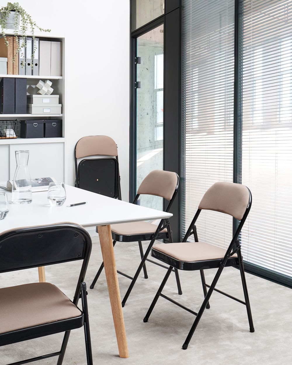 Four folding chairs on sale