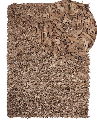 Kožený koberec 140 x 200 cm béžový MUT