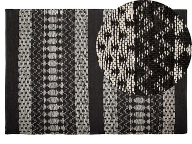 Teppich Leder schwarz / beige 140 x 200 cm abstraktes Muster Kurzflor SOKUN