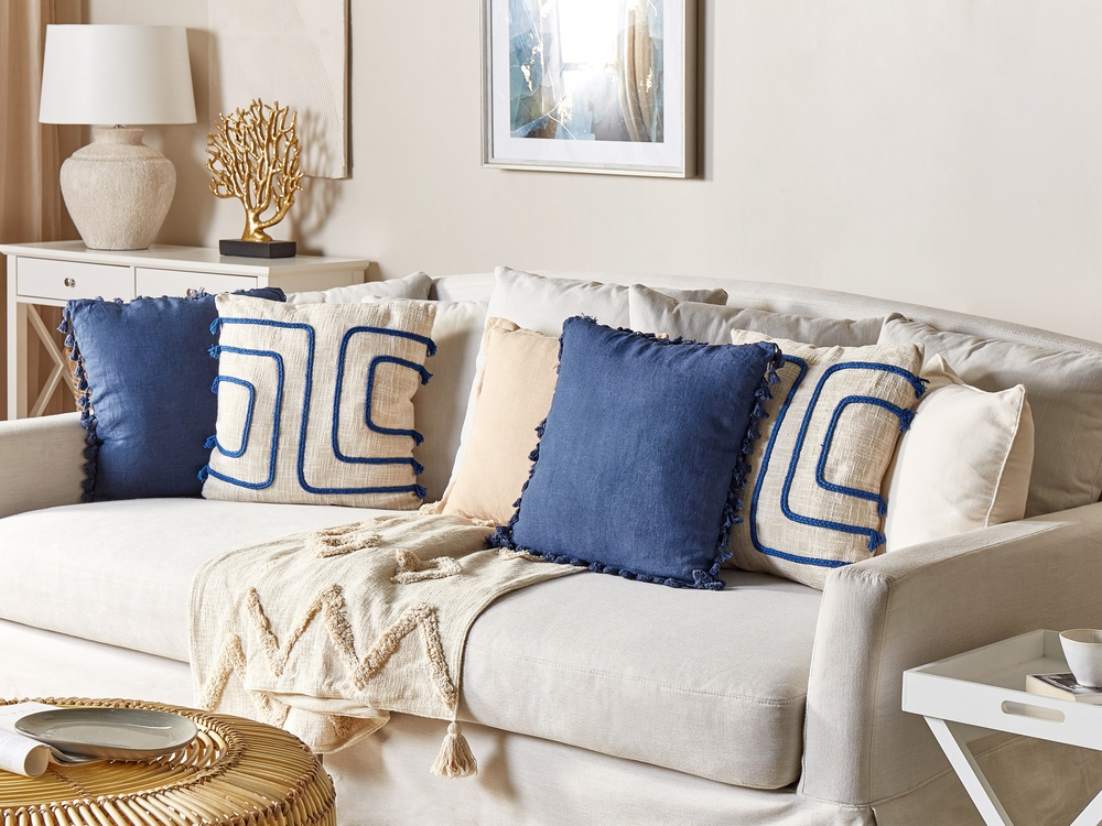 Beige couch blue pillows outlet