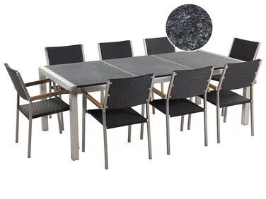 Table de jardin acier inox plateau granit triple noir flambé 220 cm avec 8 chaises en rotin GROSSETO