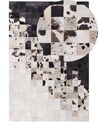 Kožený koberec 160 x 230 cm čierna/biela KEMAH_742876