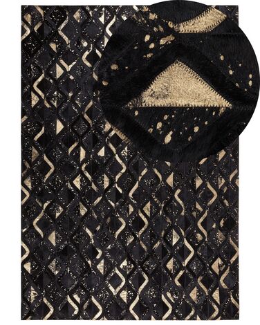 Cowhide Area Rug 140 x 200 cm Black and Gold DEVELI