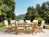 Trädgårdsmöbelset av bord och 8 stolar med dynor i beige MAUI_743950
