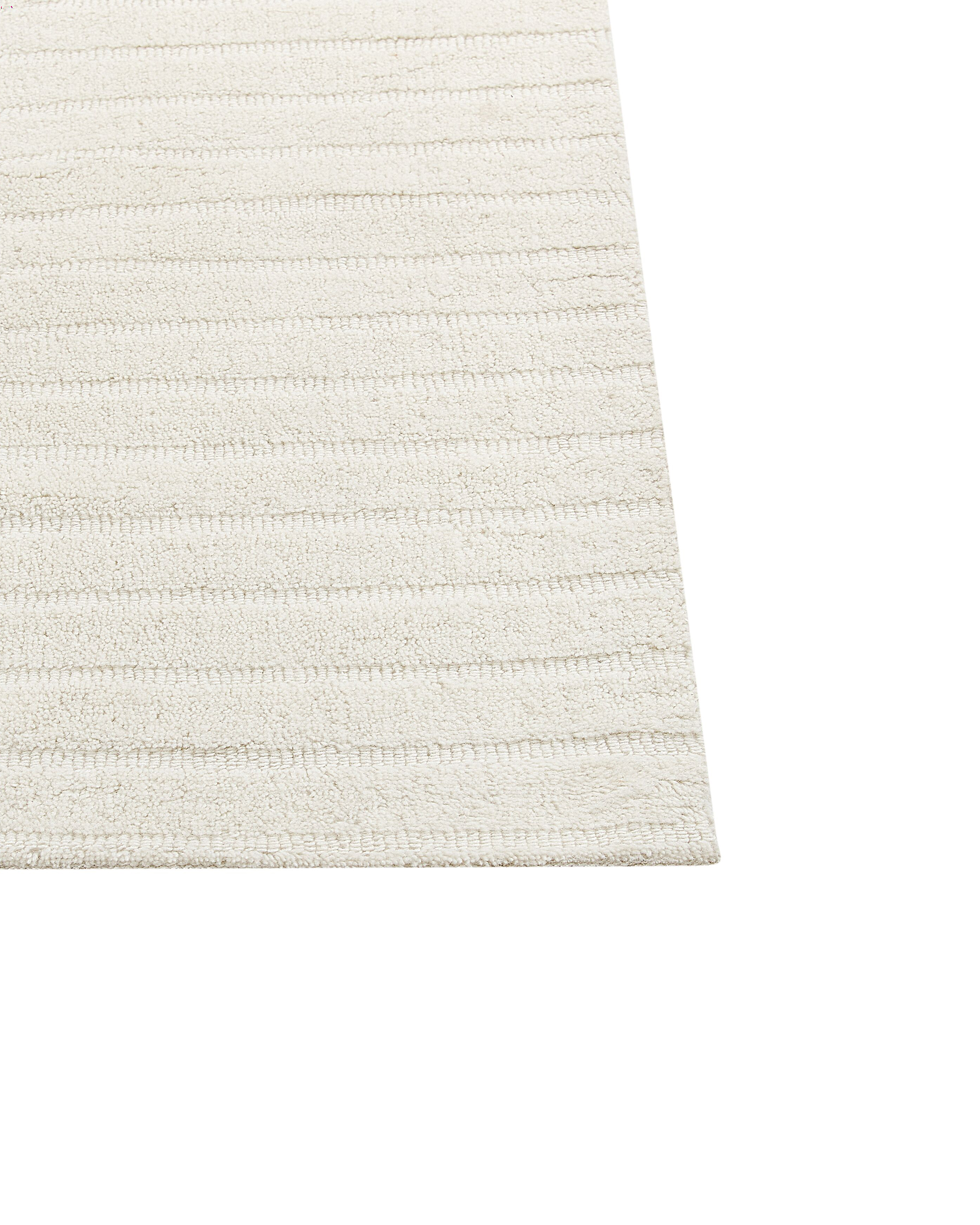 Teppich Wolle beige 300 x 400 cm abstraktes Muster Kurzflor DAGARI_885784