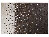Kožený koberec 140 x 200 cm hnedá/béžová EYIM_764660