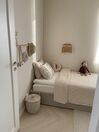 Čalúnená béžová posteľ s úložným priestorom 90 x 200 cm DINAN_835879