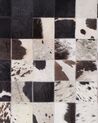 Tapis en cuir noir et blanc 140 x 200 cm KEMAH_742871