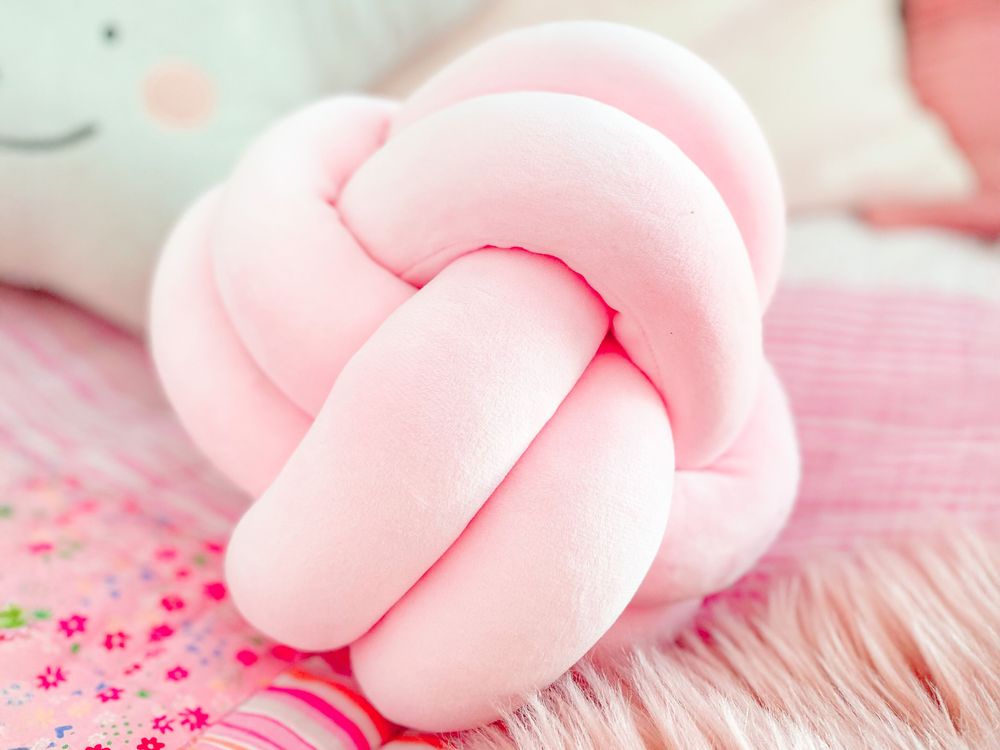 Pink knot cushion hot sale