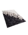 Tapis en cuir noir et blanc 140 x 200 cm KEMAH_742870