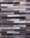 Kožený koberec šedo hnědý 140 x 200 cm AHILLI_721096