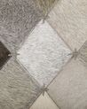 Kožený koberec 140 x 200 cm sivá/hnedá BANAZ_764631