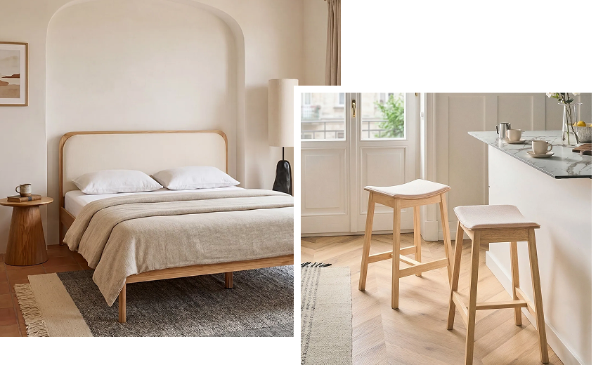 Minimalist bedroom with a bed in light tones with wooden elements. Kitchen island with two stools made of natural materials.