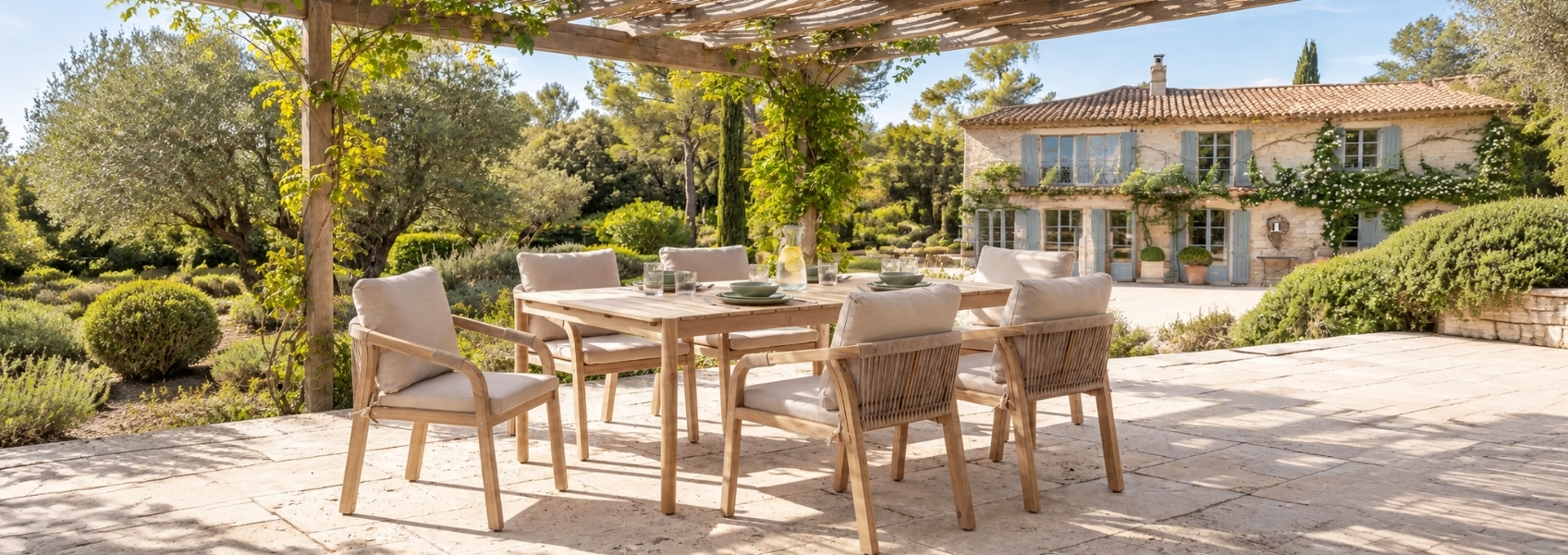 Outdoor dining set with table and chairs in a garden setting